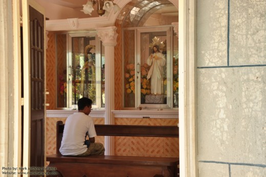 Praying inside one of the reflection rooms