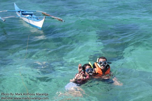 Mark and Lisa snorkeling near Crocodile Island