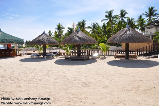 Tropical Huts on the white-sand beach