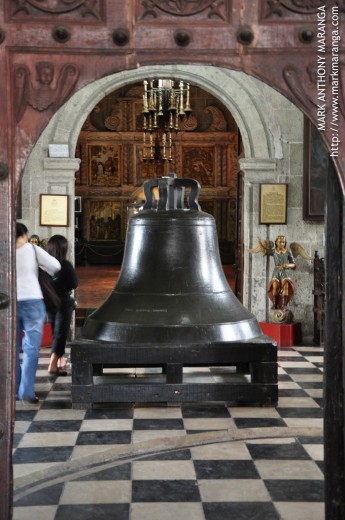The large bell inside the San Agustin Museum