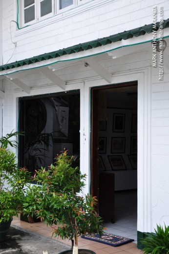 Entrance door with paintings inside