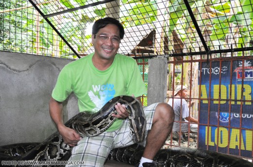 Kuya Dodong holding the Snake