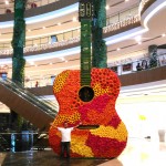 Big Guitar covered with Flowers