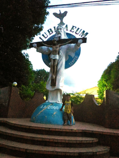 At the cross near the church