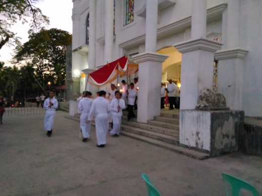 During the Procession of the Consecrated Host