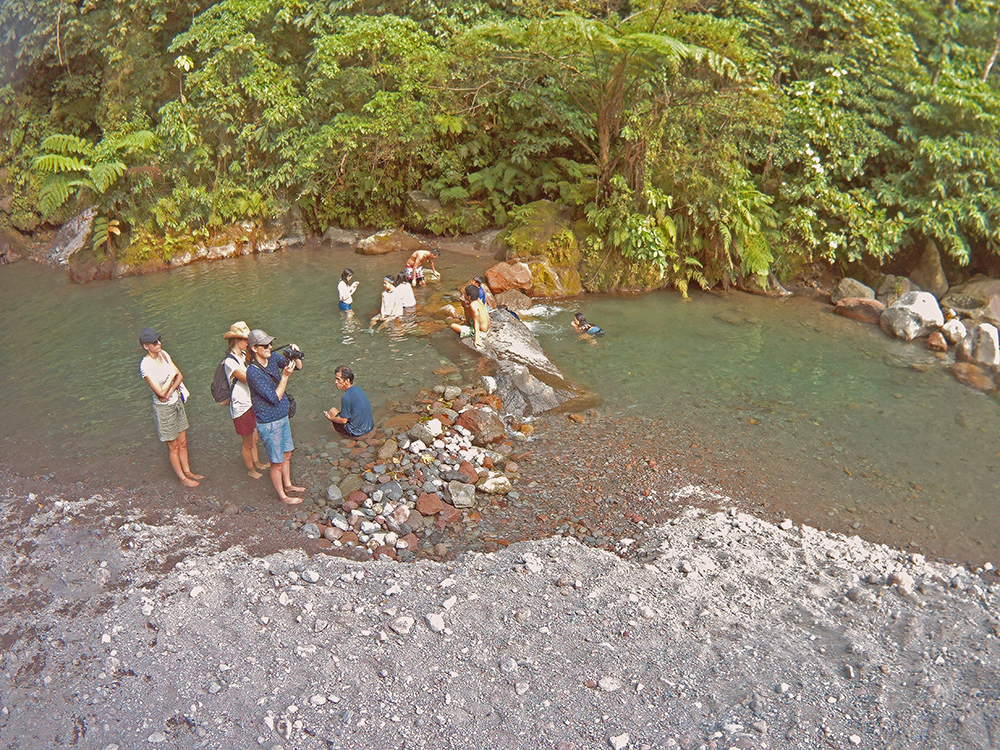 Tourists at Tuasan Falls